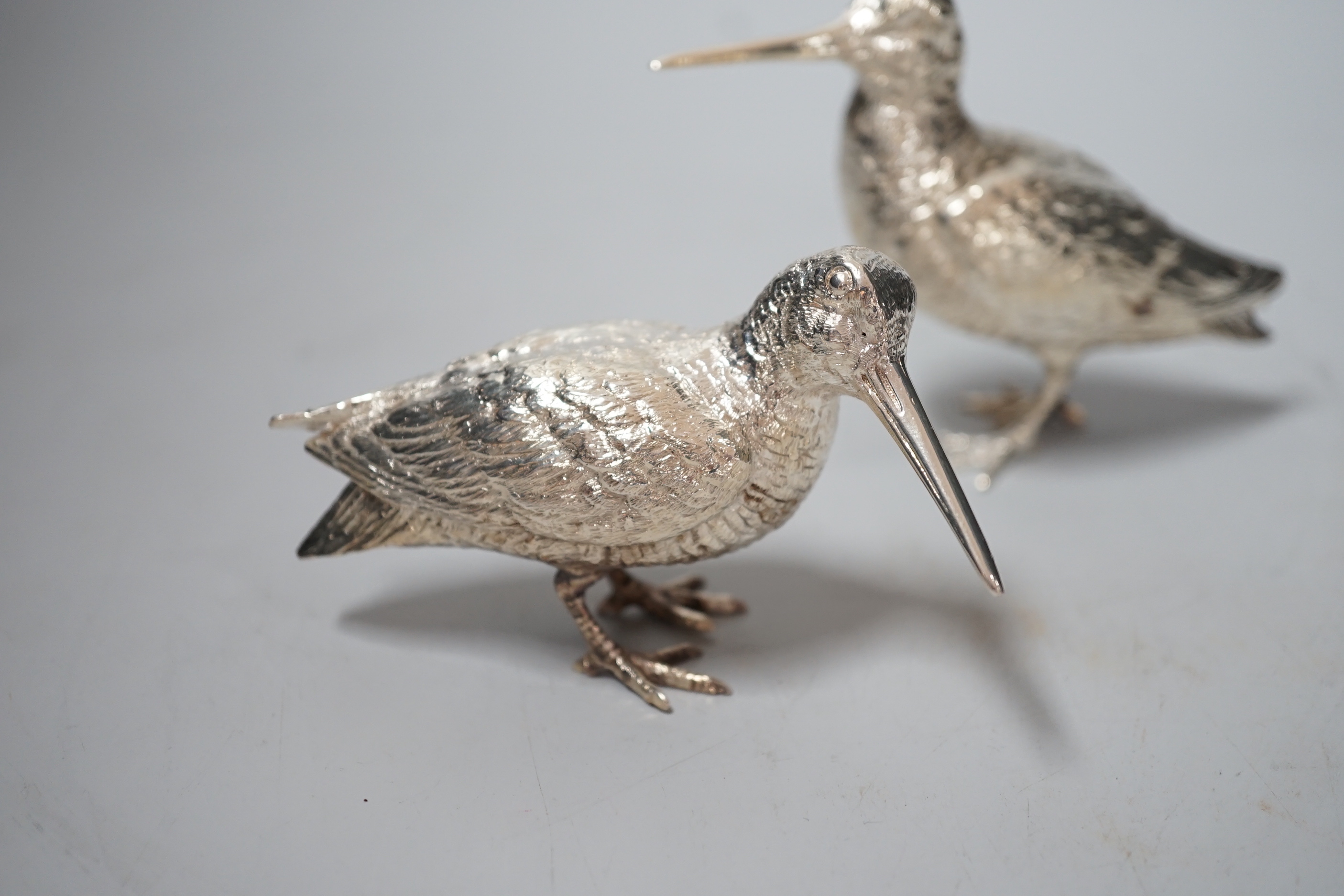 A pair of Elizabeth II silver model free-standing woodcocks, BSE Products, London, 2017, tallest 75mm, 10.5oz.
